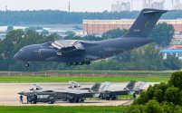 yy-20-capable-of-aerial-refueling-landing-in-the-background-v0-g7cn0b5aurec1.jpeg