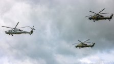 PLAAF equipment, Z-10 attack helicopter in camouflage livery and Z20 05.jpg