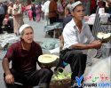uyghur--Bush--Obama--selling--ha mi gua.jpg