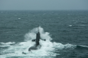 AUS HMAS Farncomb conducts pre-diving checks in the waters.png