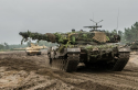 M1A2 Abrams MBTs alongside Polish Leopard IIA4 MBTs-2.png