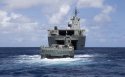 Australian Navy Landing Craft approaches HMAS Canberra off the coast of Koro Island, Fiji..jpg