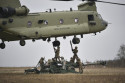 CH-47 & 2nd CavReg conduct sling load training with M777 Howitzer.png