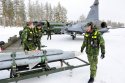 Gripen jet operational with just 6 ground crew and 2 vehicles on a road runway.jpg