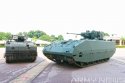 Singapore's new (unnamed) AFV vs. one of the M113s they're replacing.jpg