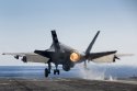 F-35C afterburner launch from USS George Washington with external GBU-12 load and gun pod..jpg