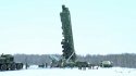 Russian RS-24 Yars ICBM being loaded into its silo from its transporter.jpg