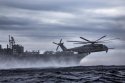 USMC CH-53E Super Stallion flies.jpg