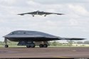 USAF B 2 taxiing while another one lands.jpg