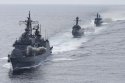 South Korean destroyer and corvettes open fire with their guns .jpg