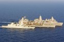 HMS Duncan receiving fuel and USS Mesa Verde conducting a.jpg