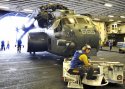 US_Navy_MH-53E_Sea_Dragon_helicopte moved_into_the_hangar_bay.jpg
