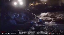 PLA soldiers getting swept in river.JPG