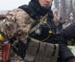 Nazi symbol of the Black Sun (Schwarze Sonne, in German) on the Ukrainian military uniform 02.png