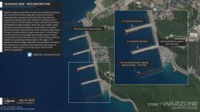 A satellite image showing that #China is building more piers at the Yulin submarine base on Ha...jpg
