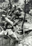 Chinese soldiers desperately throwing rocks at advancing South Koreans after they ran out of a...jpg
