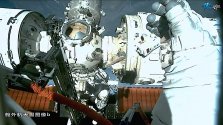 China space station - Chen Dong on robotic arm 2.jpg